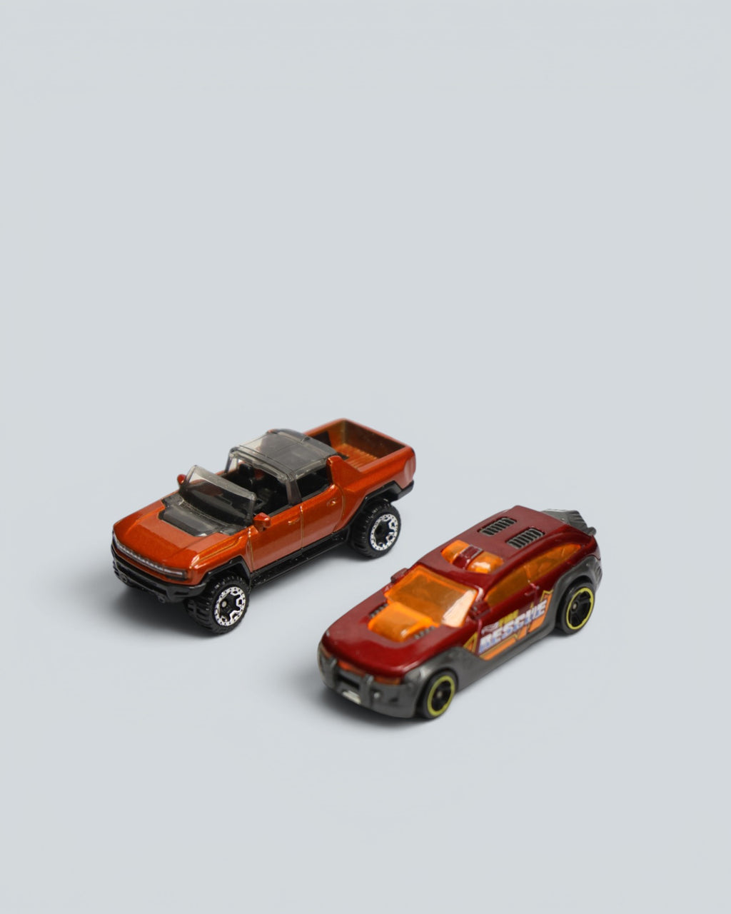 Hot Wheels Die-Cast Vehicle 2-Pack – GMC Hummer EV Pickup & HW Pursuit Fire Rescue