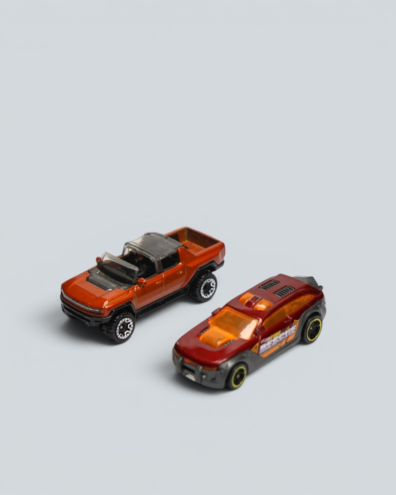 Hot Wheels Die-Cast Vehicle 2-Pack – GMC Hummer EV Pickup & HW Pursuit Fire Rescue