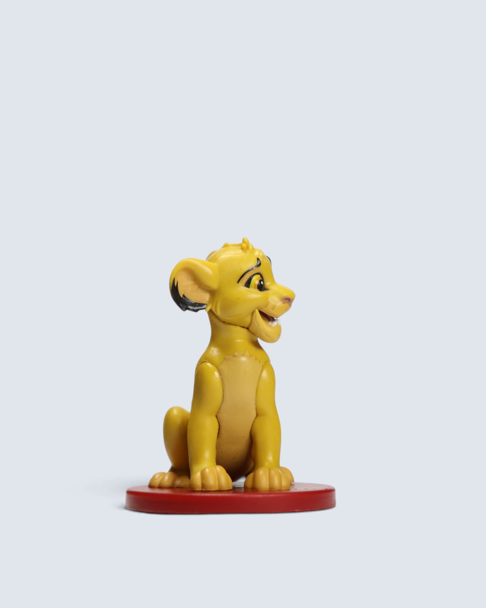 Disney The Lion King – Young Simba Sitting on Red Base Collectible