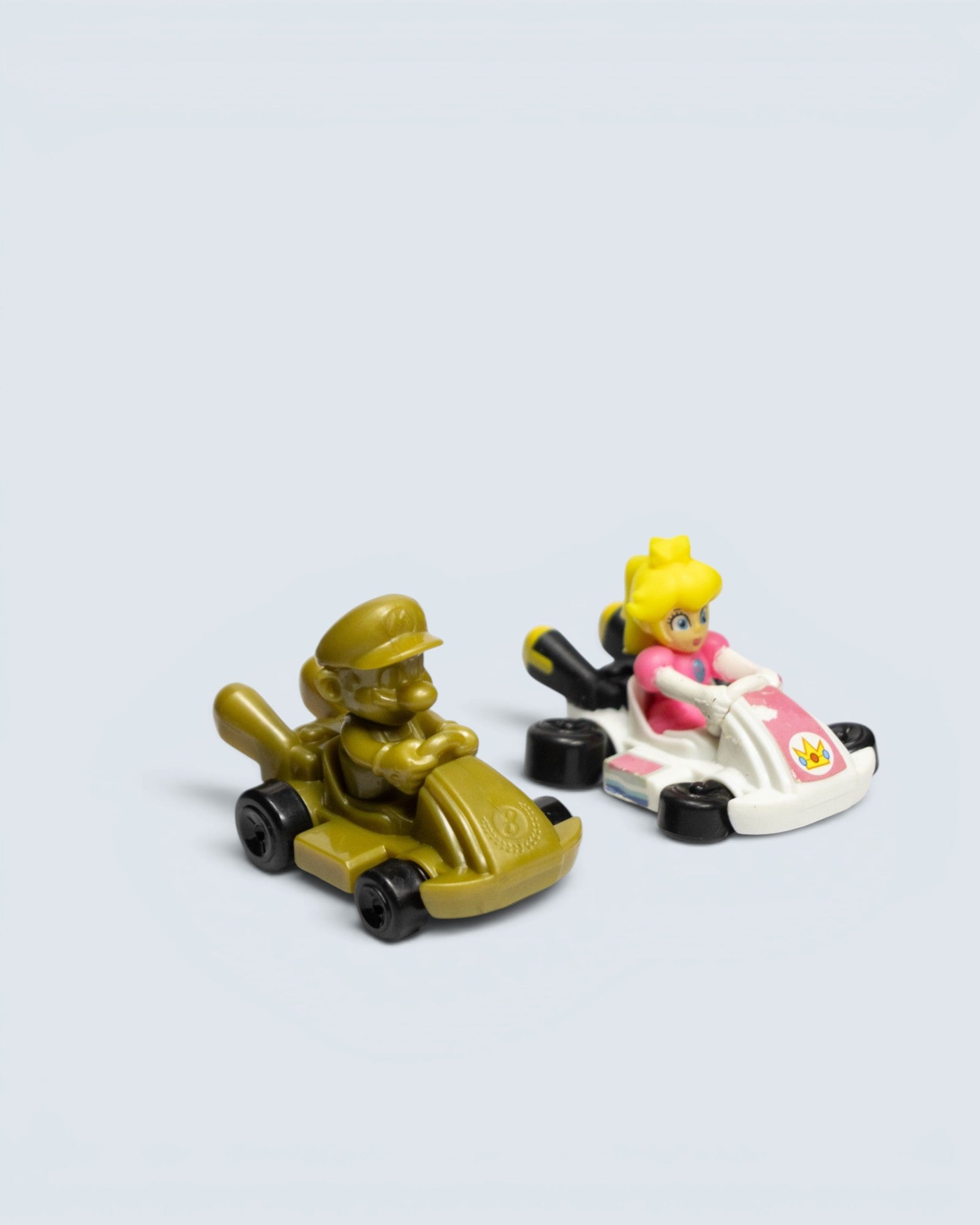 Mario Kart 8 Mini Toy Racer Figure Bundle (Gold Mario & Princess Peach)