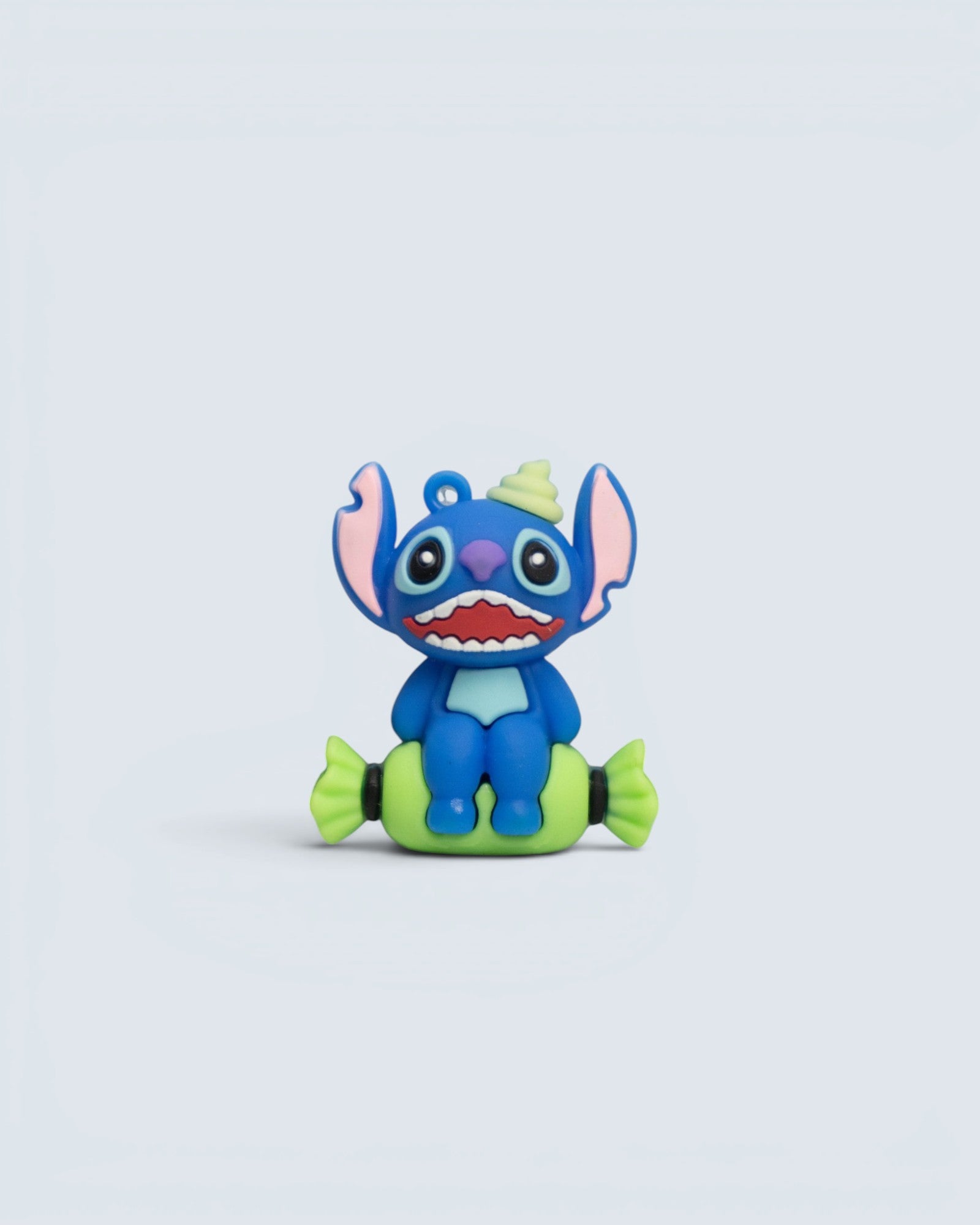 Disney Lilo & Stitch Sitting on Candy Silicone Keychain Charm