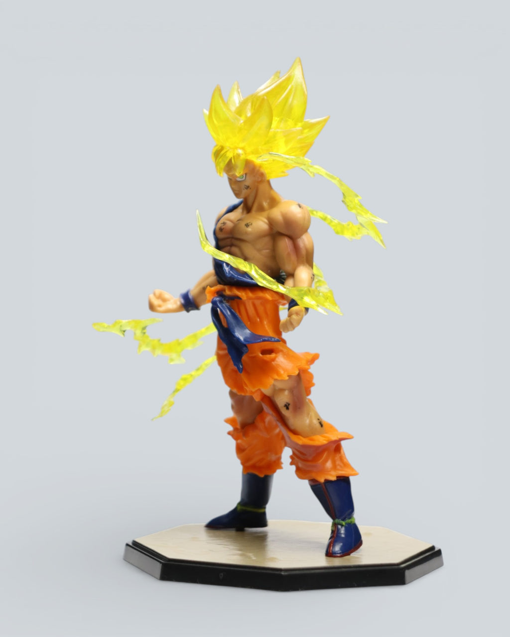 Dragon Ball Z Super Saiyan Goku Action Figure – Battle Damaged Edition with Energy Aura