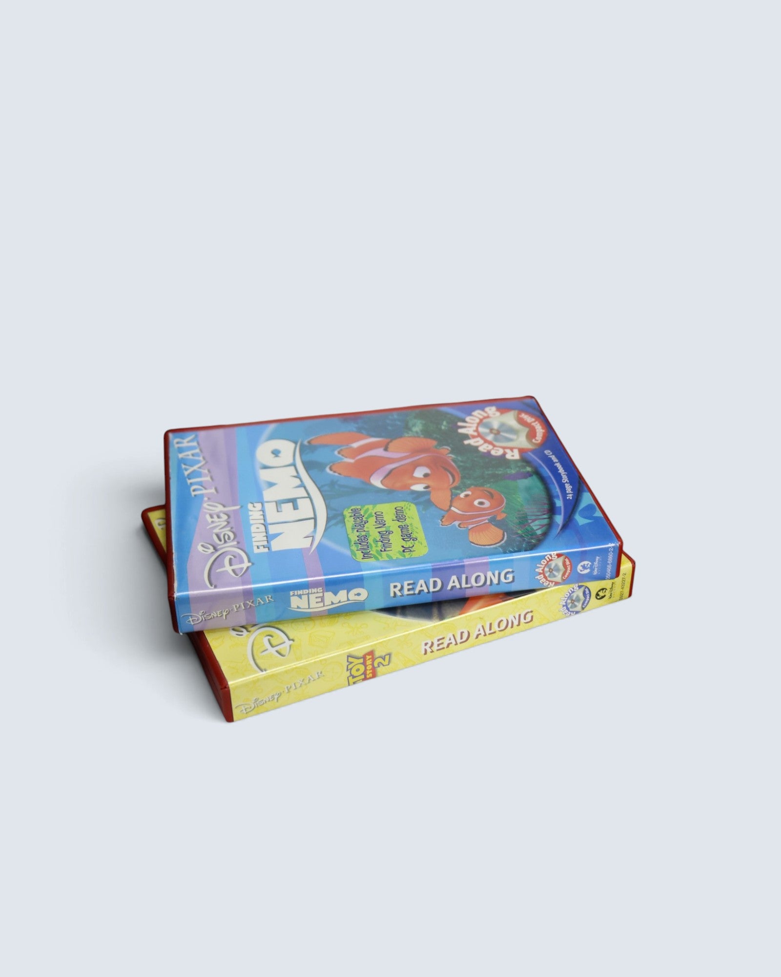 Disney Pixar Read Along 2-Disc Set: Toy Story 2 & Finding Nemo (Storybook & CD)